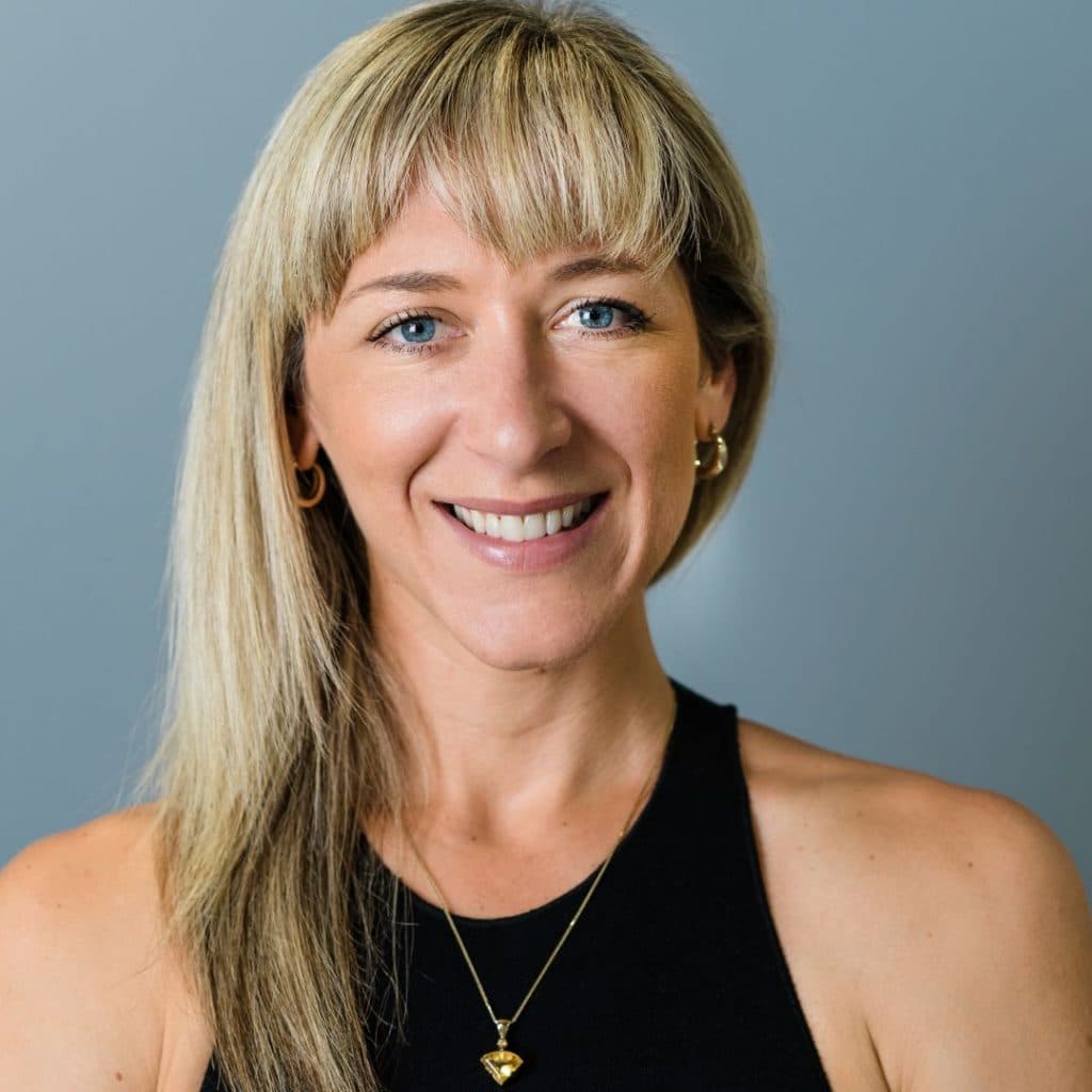 Portrait of Yvette McGaffin, Pilates leader and co-founder of Reform RX, highlighting leadership in connected reformer Pilates.